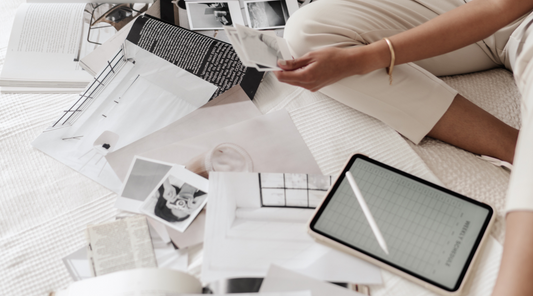 design business owner sorting through marketing assets for repurposing